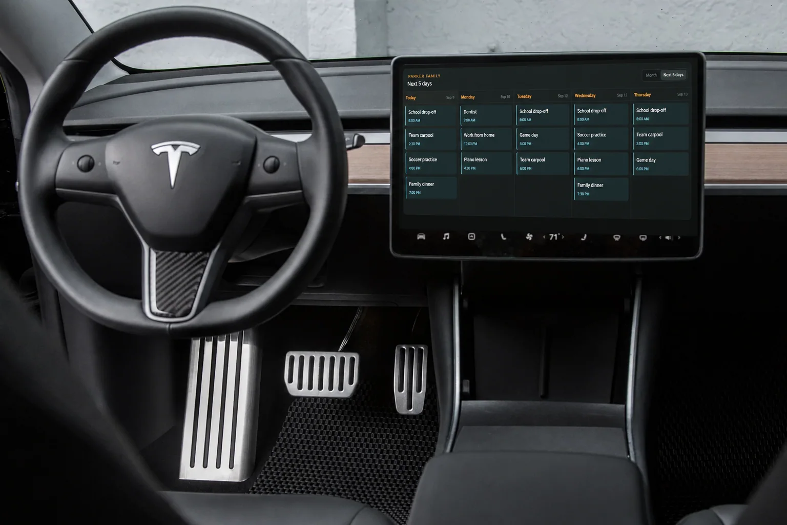 A read-only DriveDash family calendar displayed on a Tesla center screen