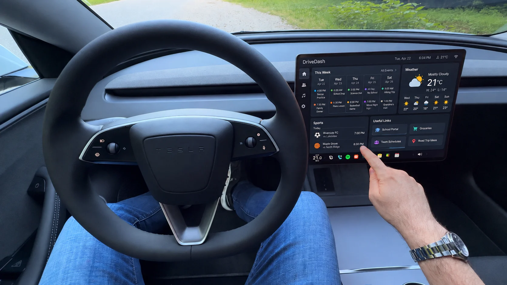 A modular DriveDash shown inside a Tesla