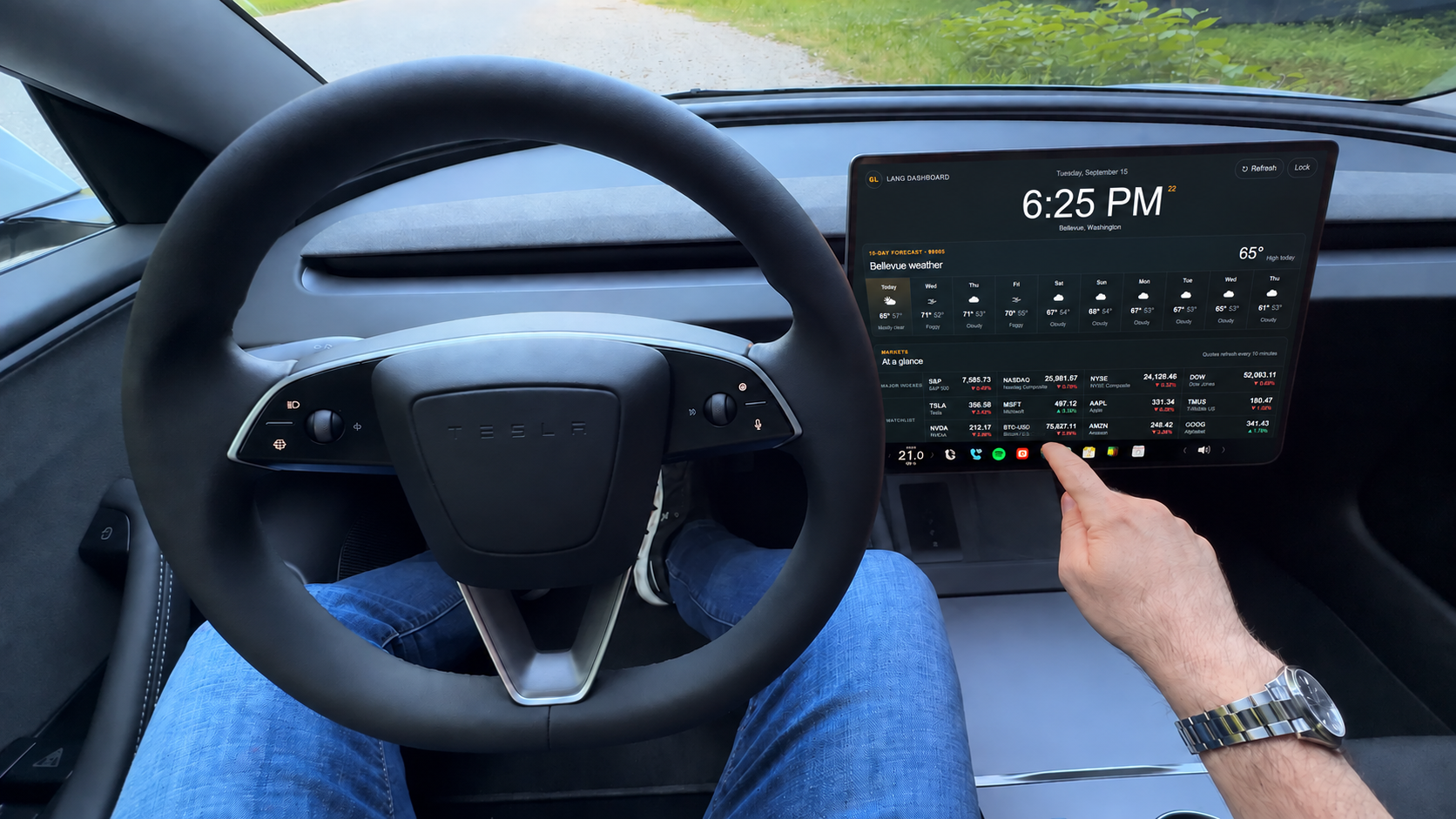 An example DriveDash weather and markets configuration displayed on a Tesla center screen